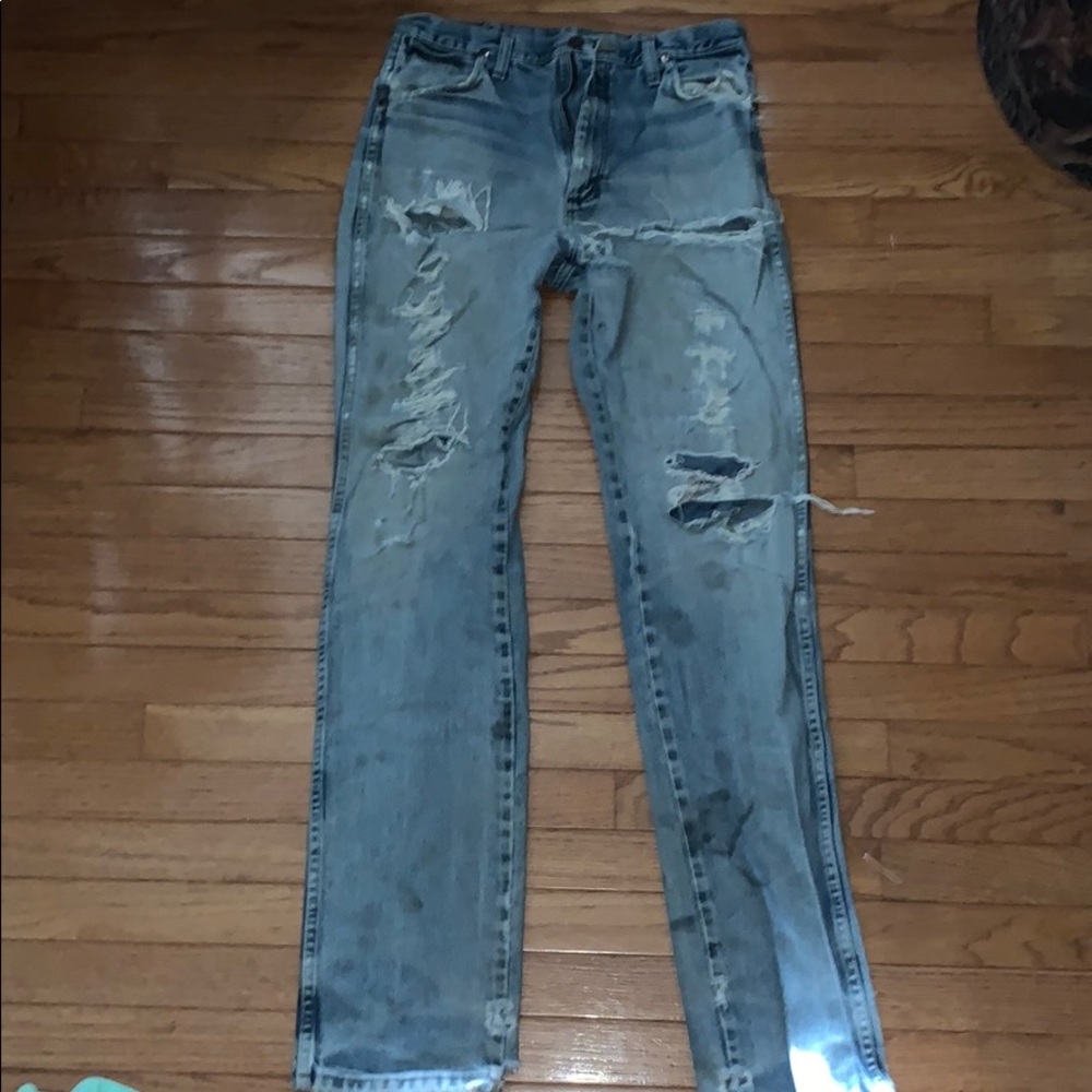 Ripped legs wranglers